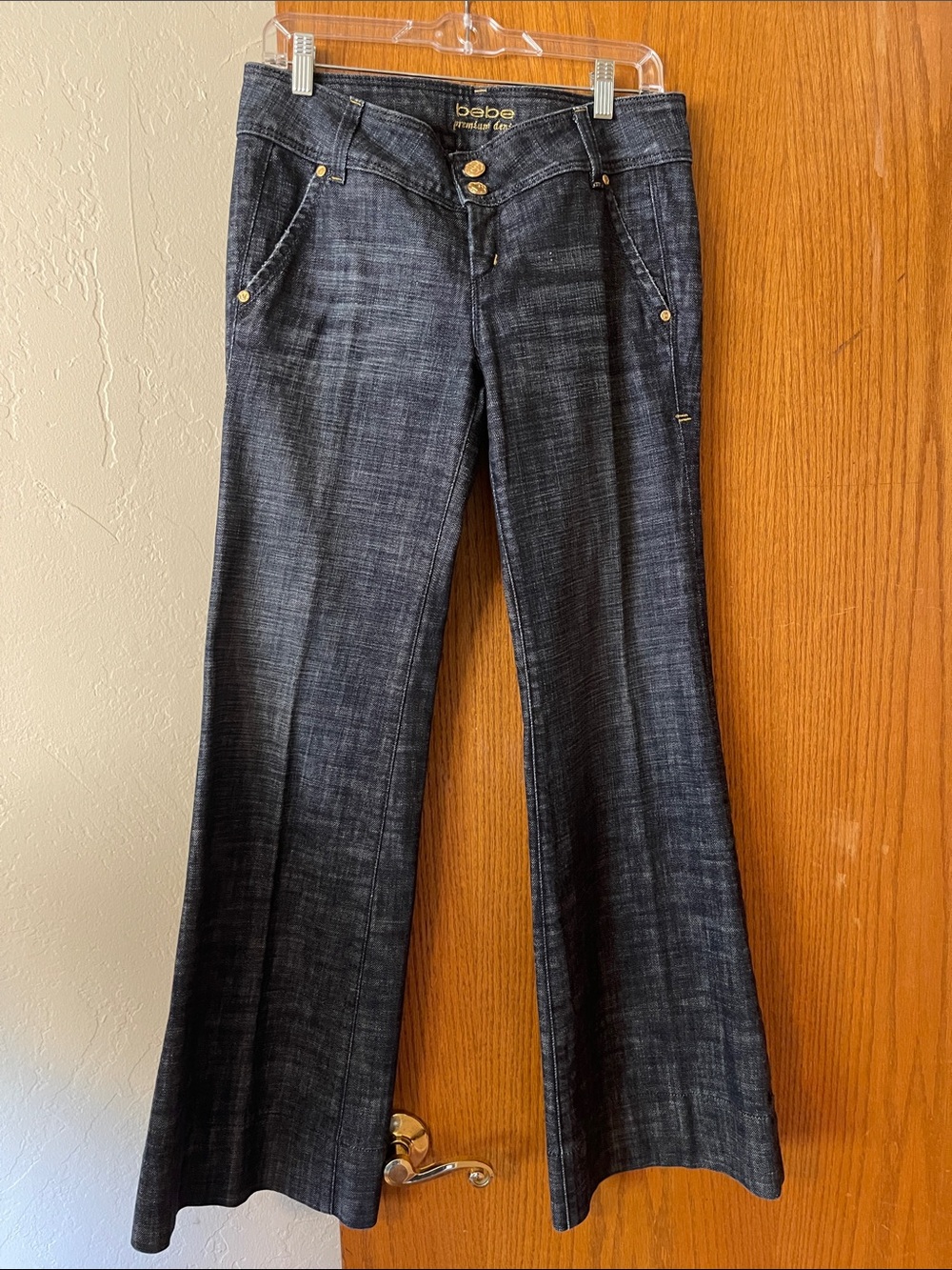 bebe Dark Blue Flare Jeans with Gold Hardware